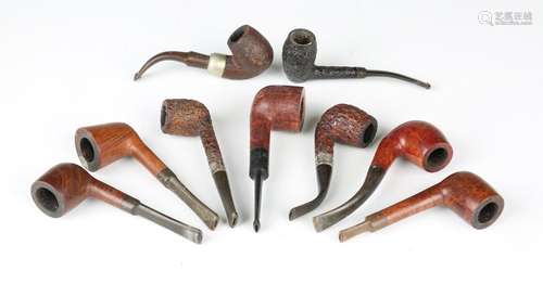 A collection of seventeen smoking pipes