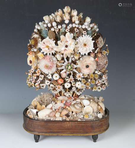 A Victorian seashell specimen flower arrangement