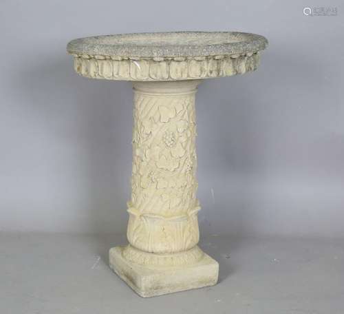 A late 20th century cast composition stone garden birdbath