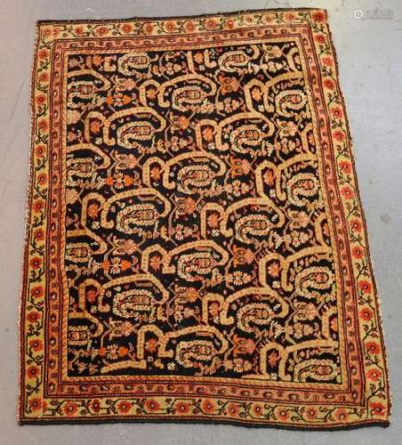 A small Senneh rug