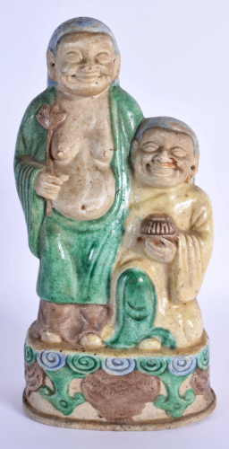 AN 18TH/19TH CENTURY CHINESE SANCAI GLAZED FIGURE OF THE HEH...
