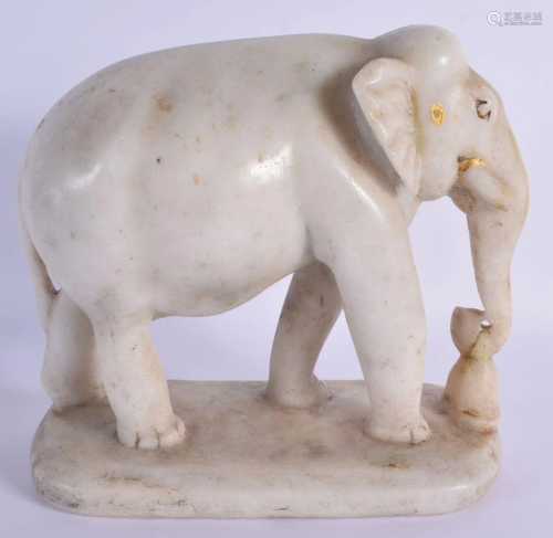 A 19TH CENTURY INDIAN RAJASTHAN CARVED MARBLE FIGURE OF AN E...