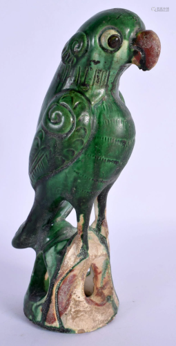 A CHINESE QING DYNASTY GREEN GLAZE FIGURE OF A PARROT modell...