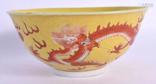 AN EARLY 20TH CENTURY CHINESE YELLOW GROUND IRON RED DRAGON ...