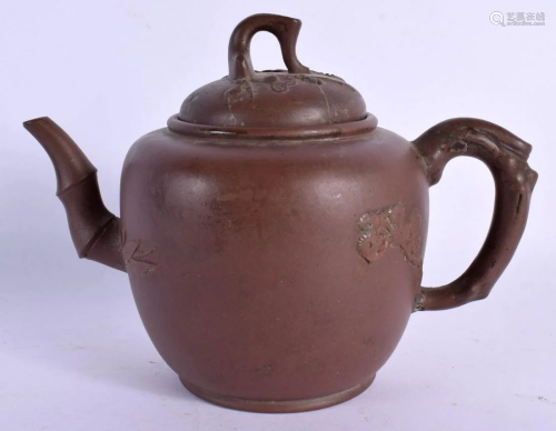 A LATE 19TH CENTURY CHINESE YIXING POTTERY TEAPOT AND COVER ...