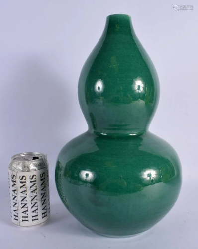 A CHINESE GREEN GLAZED DOUBLE GOURD VASE 20th Century. 34 cm...