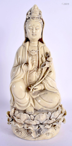 A CHINESE BLANC DE CHINE PORCELAIN FIGURE OF AN IMMORTAL 20t...