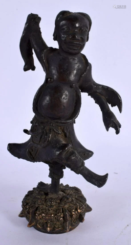 A 17TH/18TH CENTURY CHINESE BRONZE FIGURE OF A BOY Late Ming...