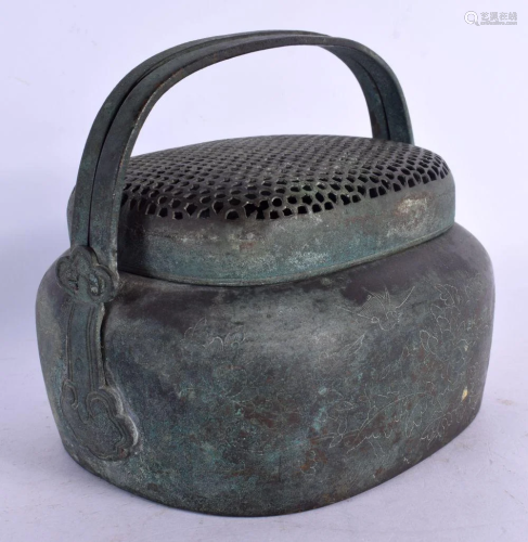 A 19TH CENTURY CHINESE BRONZE HAND WARMER AND COVER Late Qin...