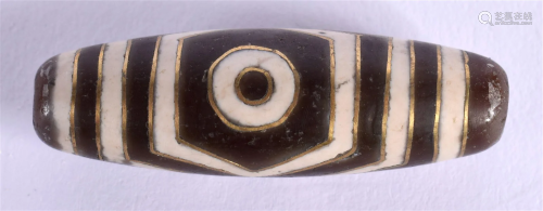A CHINESE CARVED AGATE ZHU BEAD 20th Century. 3.75 cm x 1 cm...