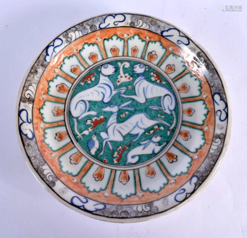 A TURKISH MIDDLE EASTERN FAIENCE DISH painted with animals. ...