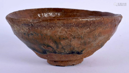 AN EARLY CHINESE HARES FOOT STONEWARE BOWL. 10.5 cm diameter...