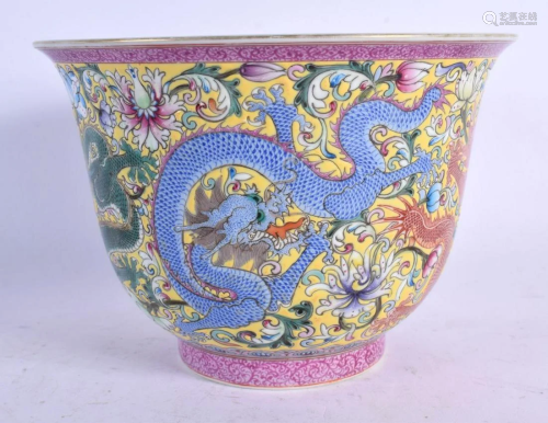 A CHINESE FAMILLE ROSE DRAGON BOWL 20th Century, bearing Qia...