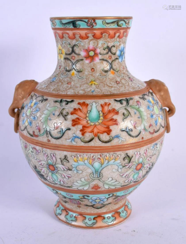 A CHINESE FAMILLE ROSE TWIN HANDLED VASE 20th Century, beari...