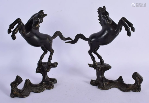 A PAIR OF 19TH CENTURY CHINESE BRONZE HORSES Ming style. 18 ...