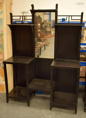 A LARGE ARTS AND CRAFTS MIRROR BACK DISPLAY UNIT modelled in...