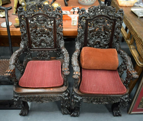 A FINE PAIR OF 19TH CENTURY CHINESE CARVED HONGMU DRAGON THR...