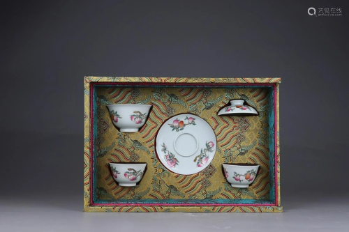 THREE CHINESE FAMILLE-ROSE CUPS DEPICTING 'PEACH AND PO...