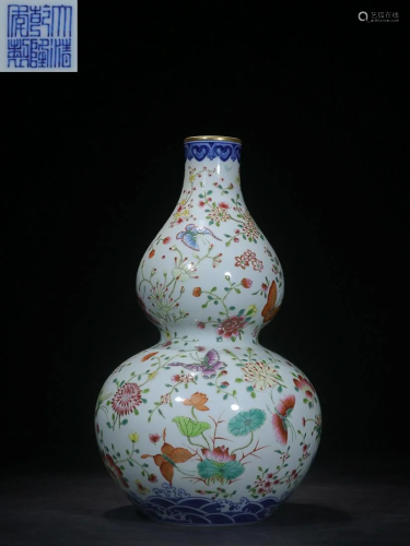 CHINESE BLUE-AND-WHITE AND FAMILLE-ROSE DOUBLE-GOURD VASE DE...