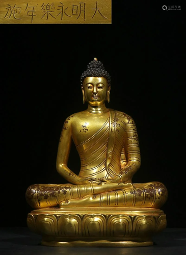 CHINESE GILT-BRONZE FIGURE OF SAKYAMUNI, 'MING YONGLE&#...