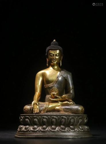 CHINESE PARCEL-GILT-BRONZE FIGURE OF SAKYAMUNI