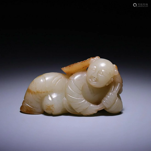 CHINESE HETIAN JADE FIGURE OF BOY HOLDING LOTUS