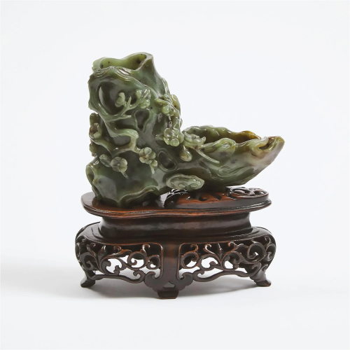 A Finely Carved Spinach Jade Trunk-Form Vase, 18th Century,