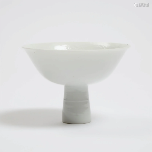 An Anhua-Decorated White-Glazed 'Dragon' Stem Bowl...