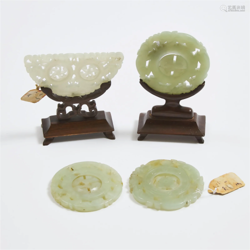 A Group of Four White Jade Reticulated Plaques With Rotatin