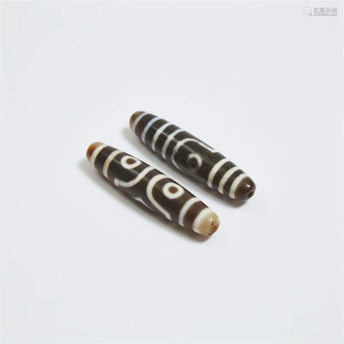 Two Large Tibetan Dzi Beads, 天珠一组两件, longest length 2....