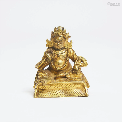 A Small Gilt Bronze Figure of Kubera, Tibet, 18th/19th Cent