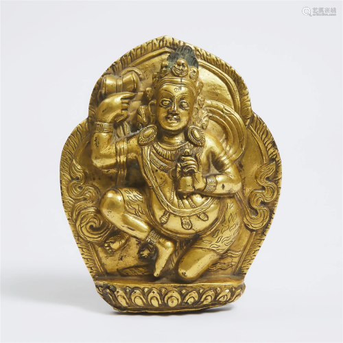 A Gilt Bronze Repoussé Plaque of Mahakala, Tibet, 17th Cent