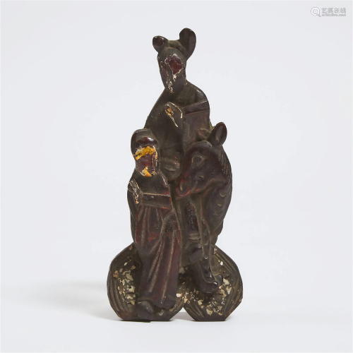 A Chinese Gilt and Lacquered Wood Carving of a Princess and