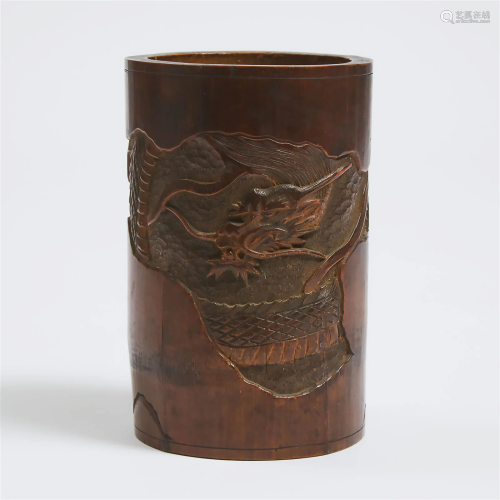 A Chinese Carved Bamboo 'Dragon' Brush Pot, 19th/2...