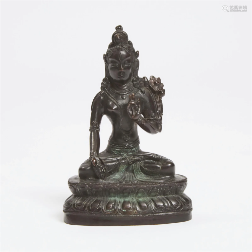 A Small Tibetan Bronze Figure of Green Tara, 18th/19th Cent