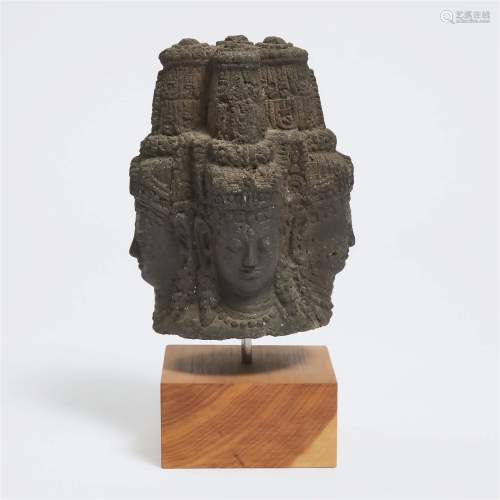 A Javanese Volcanic Stone Four-Headed Buddha, 14th Century,