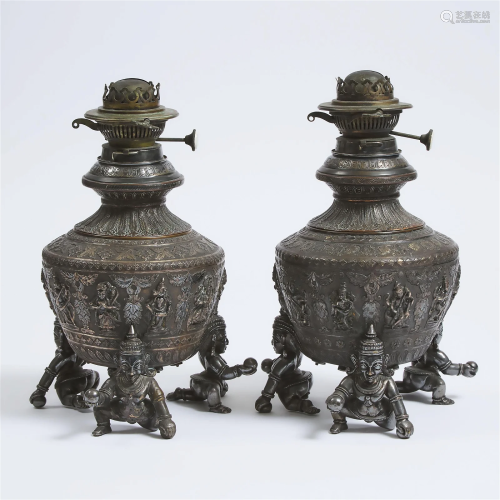 A Pair of Indian Silvered Copper Lamps, 19th/Early 20th Cen