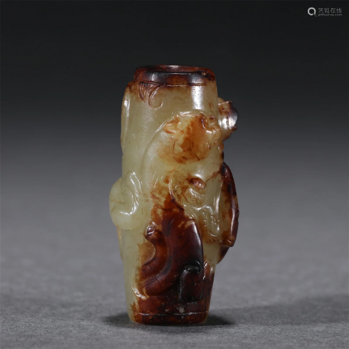 A CHINESE JADE ORNAMENTS