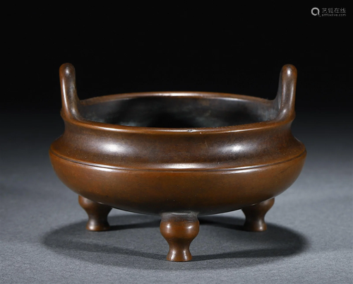 A CHINESE BRONZE TRIPOD CENSER