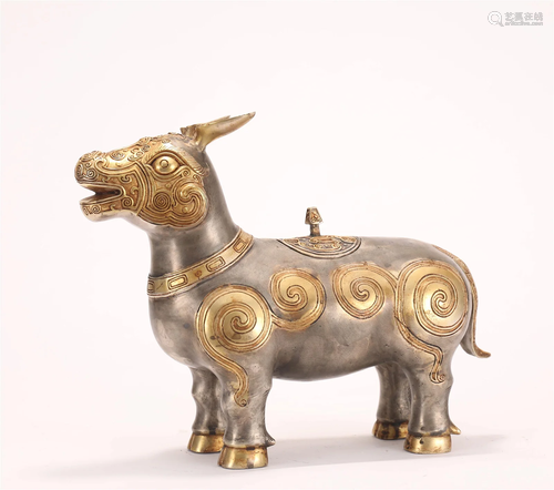 A CHINESE GILT SILVER FOO-DOG ORNAMENTS