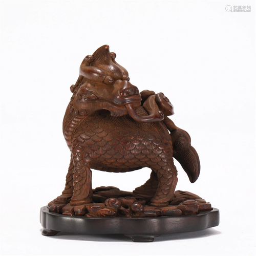 A CHINESE BAMBOOCARVING FOO-DOG ORNAMENTS