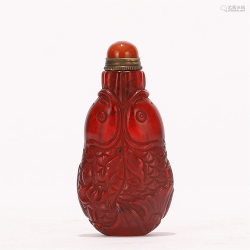 A CHINESE RED FISH JADE VASE