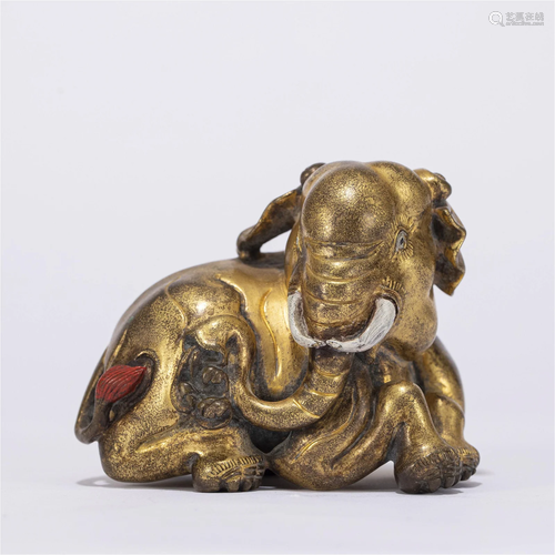 A CHINESE GILT BRONZE ELEPHANT ORNAMENTS