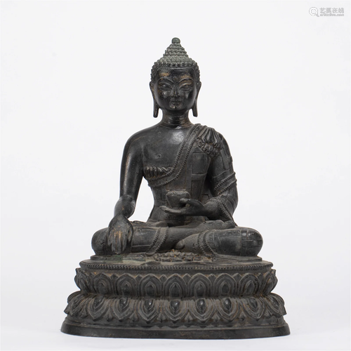 A CHINESE FIGURE OF BUDDHA SEATED STATUE