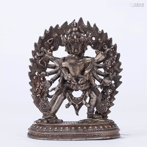 A CHINESE SILVER FIGURE OF BUDDHA STATUE