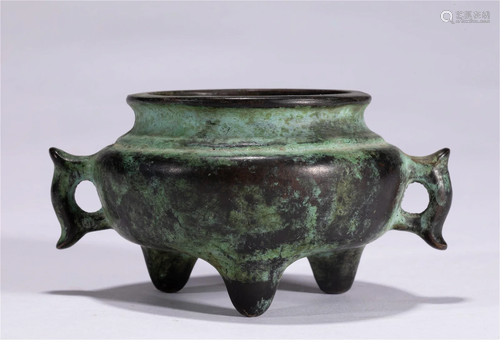 A CHINESE BRONZE TRIPOD CENSER