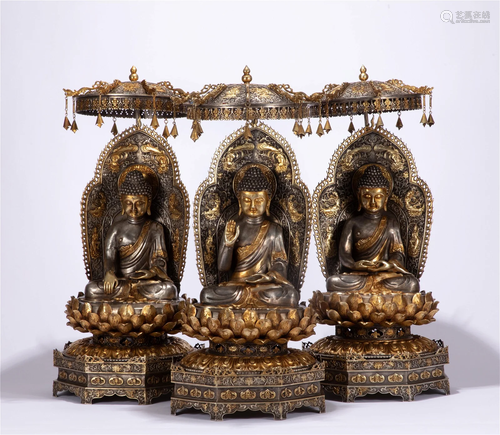 A GROUP OF CHINESE SILVER FIGURE OF BUDDHA STATUE