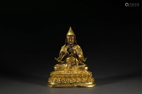 A CHINESE GILDING FIGURE OF BUDDHA STATUE