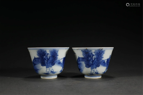 A PAIR OF CHINESE BLUE AND WHITE FIGURE STORY CUPS