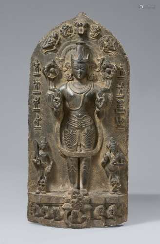 A large black stone Pala stele of Surya. Northeast-India, Bi...